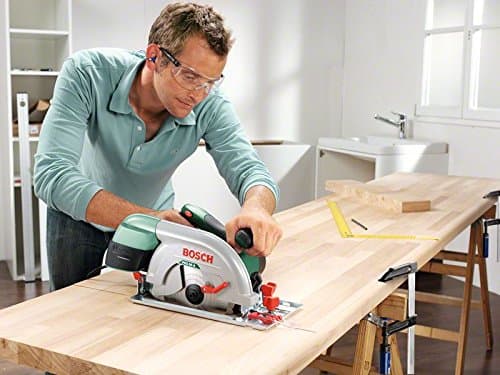 Bosch Scie circulaire PKS 66 A pour professionnels : tronçonneuse bois puissante 1600W, profondeur de coupe 66mm, parfai